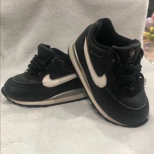 Size 5 unisex Nike shoes